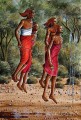 Ndeveni Maasai Morans bailando cerca del bosque desde África